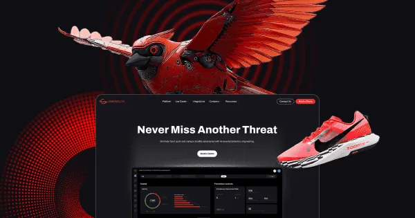 A robotic bird with red wings and a sneaker in front of a computer screen displaying cybersecurity graphics.